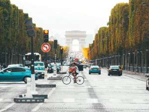 Riding A Bicycle On A Busy Road Riding A Bicycle On A Busy Road