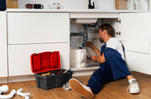 Image from freepik -  fort collins plumber fixing